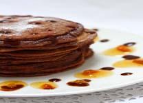 Eggless Chocolate Pancakes Served with Orange and Chocolate Sauce